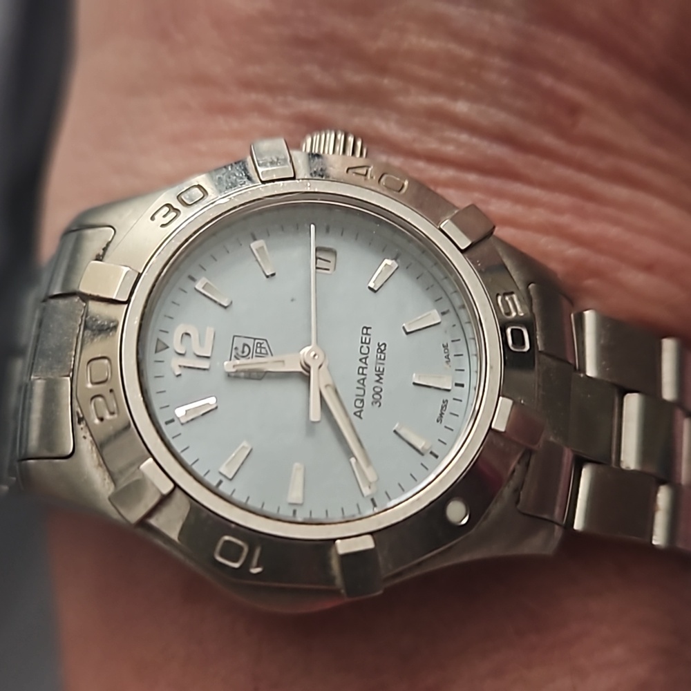 Woman's stainless steel TAGHeuer watch